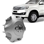 Ficha técnica e caractérísticas do produto Calota Centro De Roda Toyota Hilux 2013 2014 Prata Com Emblema Fixação Por Encaixe